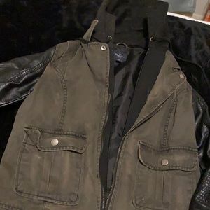 Woman’s Hooded Green Jean Leather Sleeved Jacket